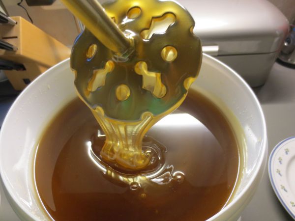 Honig rühren mit dem Auf und Ab